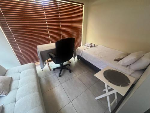 TV a/nebo společenská místnost v ubytování Bowden Guesthouse