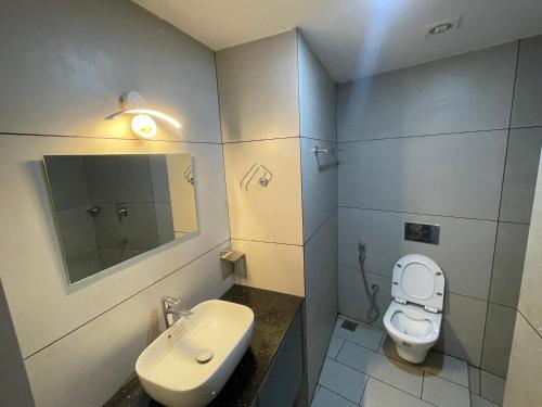 Koupelna v ubytování Apex Residency Inn