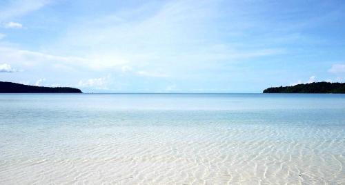 
a beach with a clear blue sky at Paradise Villas Koh Rong Sanloem in Koh Rong Sanloem
