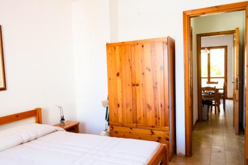 Postel nebo postele na pokoji v ubytování Alghero - Mare a 2 passi - Casa grande con Piscina e Wifi