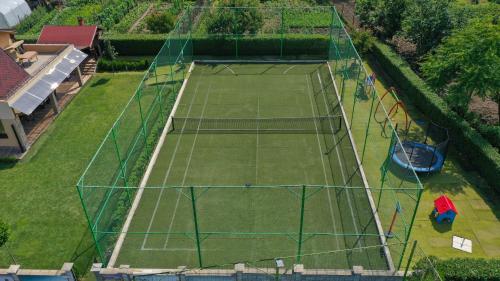 Tenis dan/atau kemudahan skuasy di Guest House ERIDA atau berdekatan