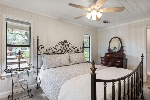 a bedroom with a bed and a ceiling fan at OT 2905 BellaVida Haus in New Braunfels