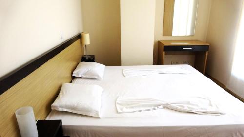 Katil atau katil-katil dalam bilik di Seafront Apartment im Obzor Beach Resort