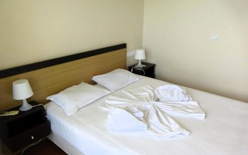Katil atau katil-katil dalam bilik di Seafront Apartment im Obzor Beach Resort