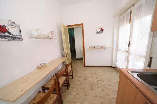 a kitchen with a counter top and a sink at Da Piero e Gina in Palidoro