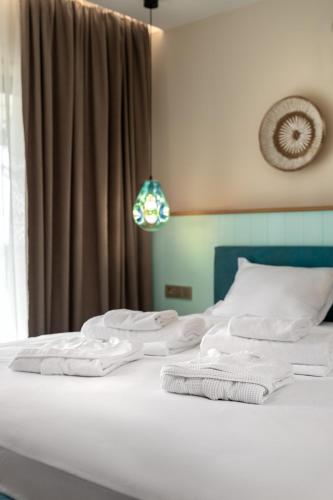 Ένα ή περισσότερα κρεβάτια σε δωμάτιο στο Villa Mare Halkidiki