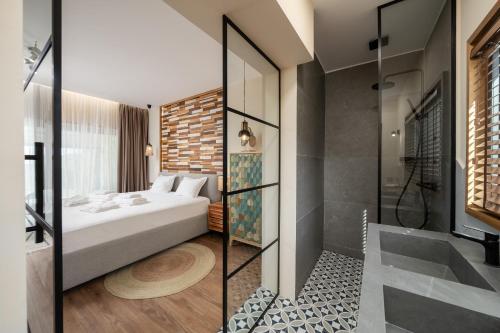 Ένα ή περισσότερα κρεβάτια σε δωμάτιο στο Villa Mare Halkidiki