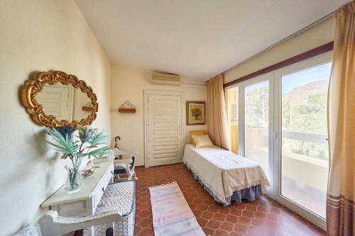 Ένα ή περισσότερα κρεβάτια σε δωμάτιο στο El Palomar