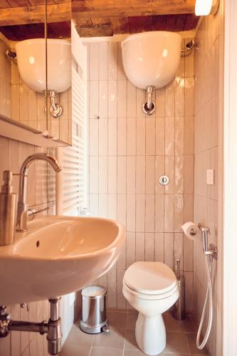 a bathroom with a sink and a toilet at Agriturismo Fattoria Poggio di Fiesole in Fiesole