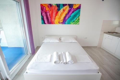 Posteľ alebo postele v izbe v ubytovaní Adriatic Apartment