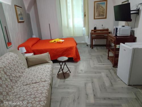 Televízia a/alebo spoločenská miestnosť v ubytovaní Casa vacanze su sorighe.