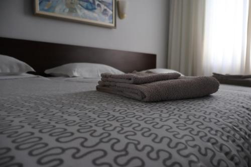 Katil atau katil-katil dalam bilik di Family Hotel Avramov