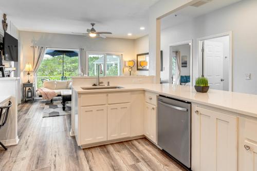 a kitchen with a sink and a counter top at Beach and Pool Access at Lake Travis Family Getaway! in Point Venture