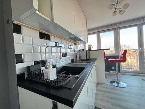 Η κουζίνα ή μικρή κουζίνα στο Apartament Everest z widokiem na morze