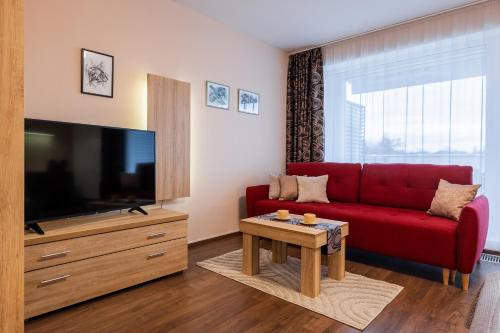 TV a/nebo společenská místnost v ubytování Apartmány Viva Třeboň