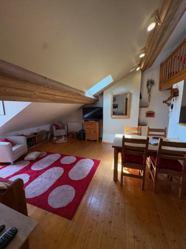 Zona de estar de Charmant appartement avec jolie vue