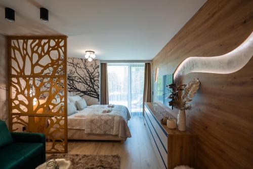 Ένα ή περισσότερα κρεβάτια σε δωμάτιο στο MyFlat Wave Lilien Suite