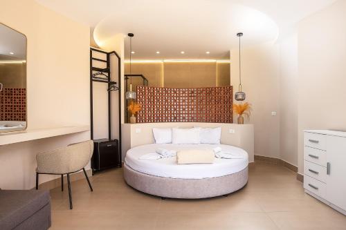 Cama o camas de una habitación en La Palma Beachfront Suites