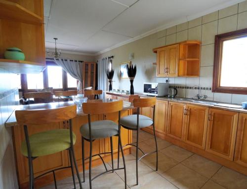 Kuchyň nebo kuchyňský kout v ubytování Magoebaskloof Hotel