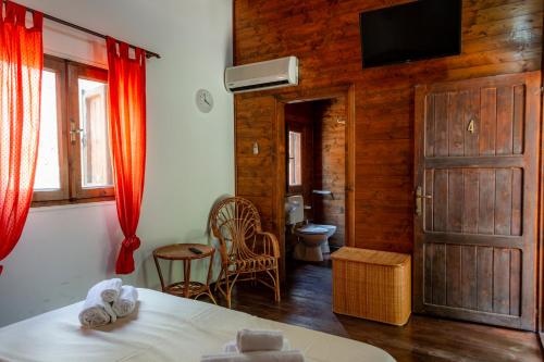 Postel nebo postele na pokoji v ubytování B&B Agriturismo 'A Cunziria