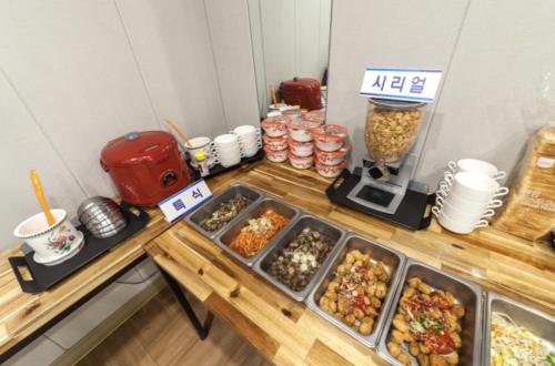 a buffet with different types of food on a table at Gwangju Hanam 1st Hotel in Gwangju