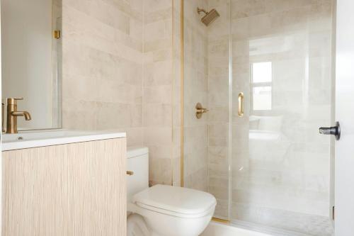 a bathroom with a toilet and a shower at Sonder by Marriott Bonvoy The Edison Apartments Old City in Philadelphia