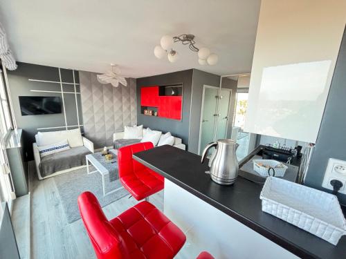 Μια τηλεόραση ή/και κέντρο ψυχαγωγίας στο Apartament Everest z widokiem na morze