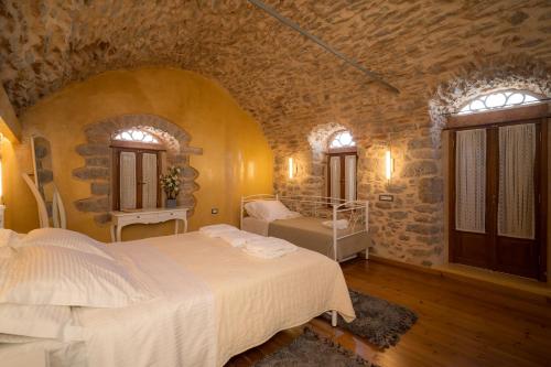 Postel nebo postele na pokoji v ubytování Mills Residence