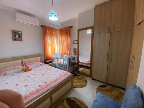 Ένα ή περισσότερα κρεβάτια σε δωμάτιο στο Apartment Norga