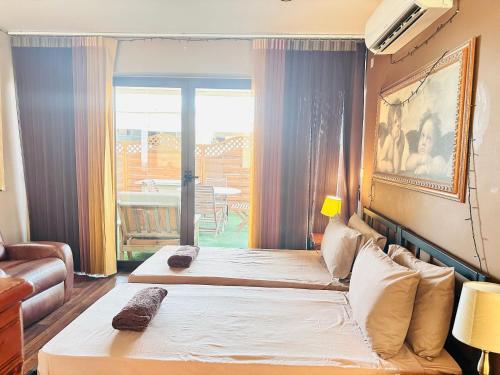Postel nebo postele na pokoji v ubytování Lotus Guest House Malta