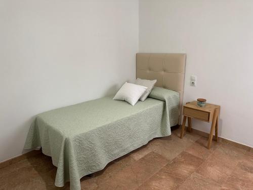 Ένα ή περισσότερα κρεβάτια σε δωμάτιο στο Casa Dani