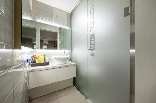 Koupelna v ubytování Sangmu Nemo Hotel