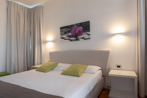 Кровать или кровати в номере B&B White con Parcheggio Privato