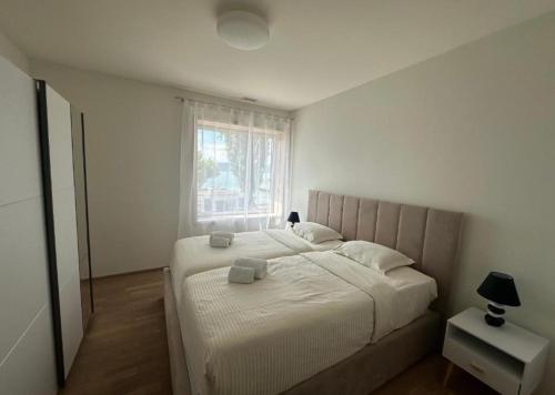 Postel nebo postele na pokoji v ubytování Hotel Du Quai
