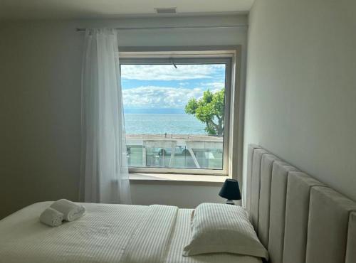 Postel nebo postele na pokoji v ubytování Hotel Du Quai