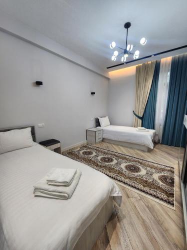 Katil atau katil-katil dalam bilik di ANDL APARTMENTS