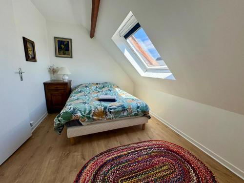 Postel nebo postele na pokoji v ubytování Brèche Marais - Duplex niché en bord de mer
