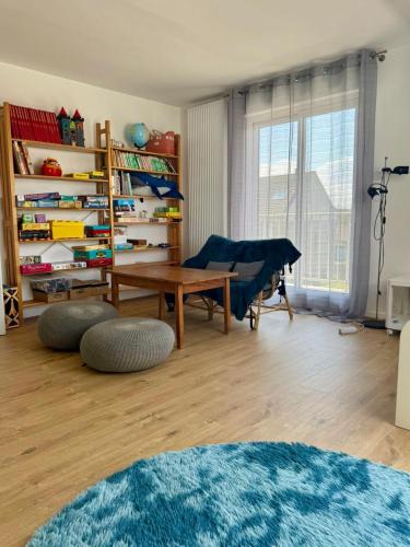 Postel nebo postele na pokoji v ubytování Brèche Marais - Duplex niché en bord de mer