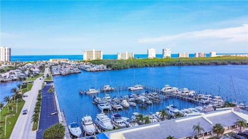 an aerial view of a marina with boats in the water at Intracoastal Breezes N1173 in Jensen Beach