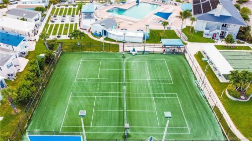 an aerial view of a tennis court at Intracoastal Breezes N1173 in Jensen Beach