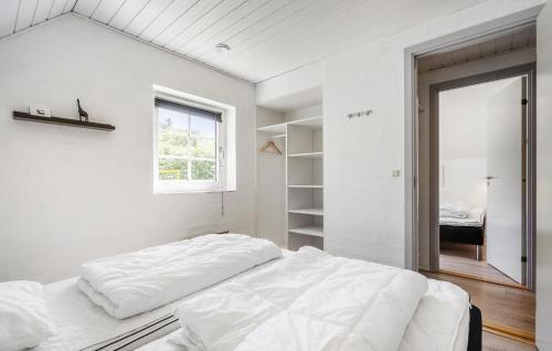 Ένα ή περισσότερα κρεβάτια σε δωμάτιο στο Stunning Home In Ulfborg With Sauna
