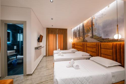 Postel nebo postele na pokoji v ubytování Hotel Eagle