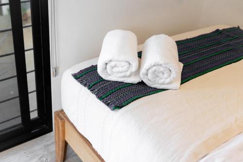 Postel nebo postele na pokoji v ubytování Esssential PXM Arkitainer Residential Lofts