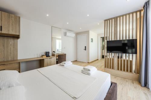 Postel nebo postele na pokoji v ubytování Sea La Vie Suites