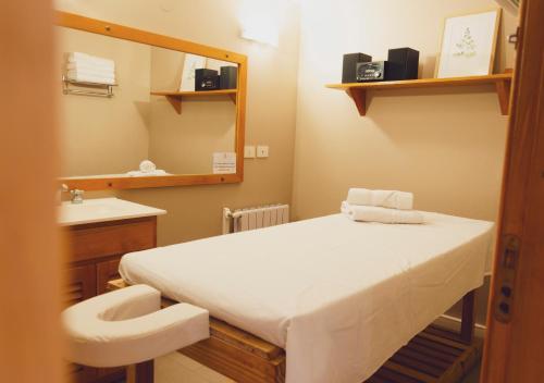 Postel nebo postele na pokoji v ubytování ONA Apart Hotel and Spa