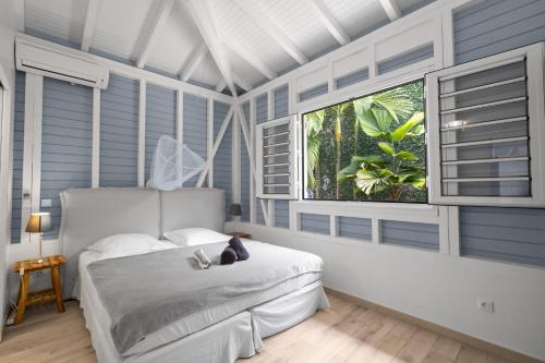 Llit o llits en una habitació de Villa Baska