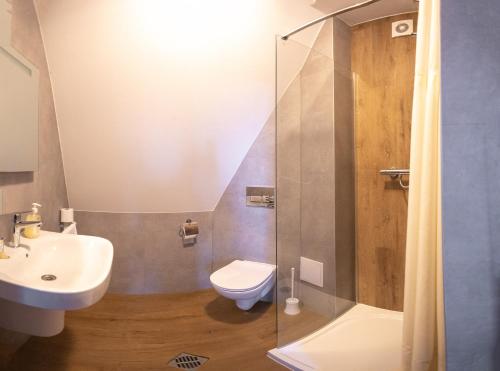Koupelna v ubytování Hotel Na Rogatce