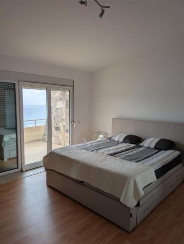 Llit o llits en una habitació de Vila Anja