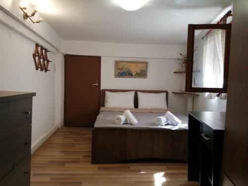 Ένα ή περισσότερα κρεβάτια σε δωμάτιο στο Eleni's Traditional Home with Barbeque