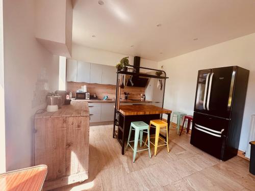 Kuchyň nebo kuchyňský kout v ubytování Superbe maison en pierre